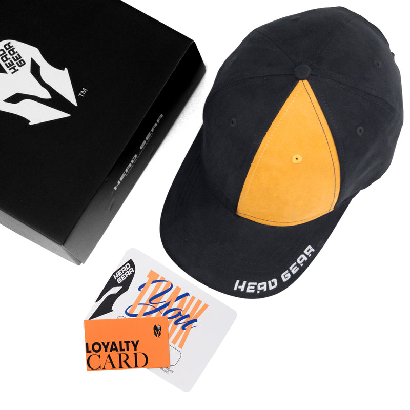 HEAD GEAR MISMATCHED BLACK AND YELLOW CAP